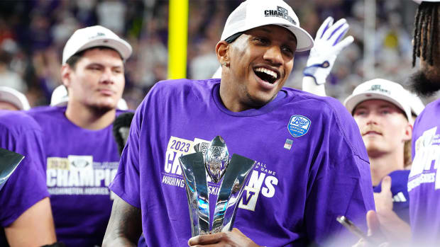 Washington’s Michael Penix Jr. celebrates a Pac-12 championship.